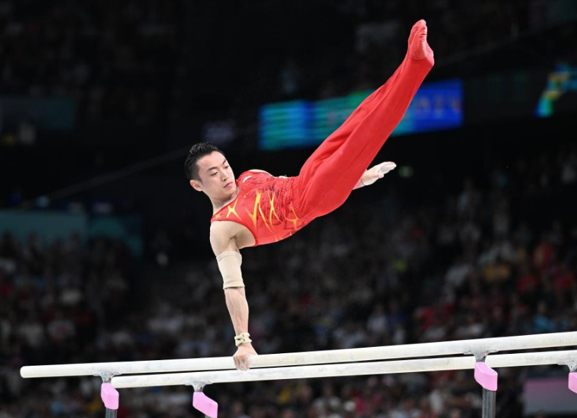中国体操队表现抢眼,跻身决赛 中国体操队表现抢眼,跻身决赛